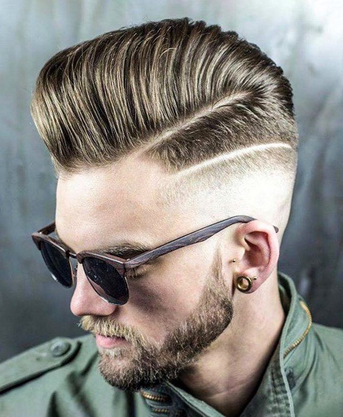 Stylish modern retro haircut side part with mid fade with parting of a  school boy guy in a barbershop on a brown background Stock Photo by ©gum92  314093230