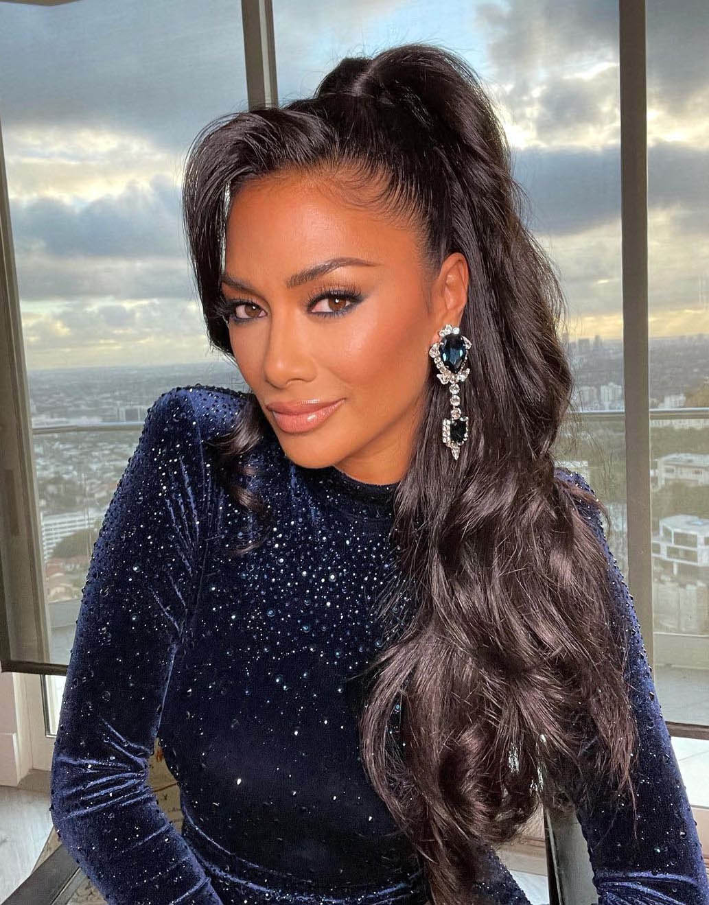 Nicole Scherzinger's Long Wavy Ponytail With Side Bangs