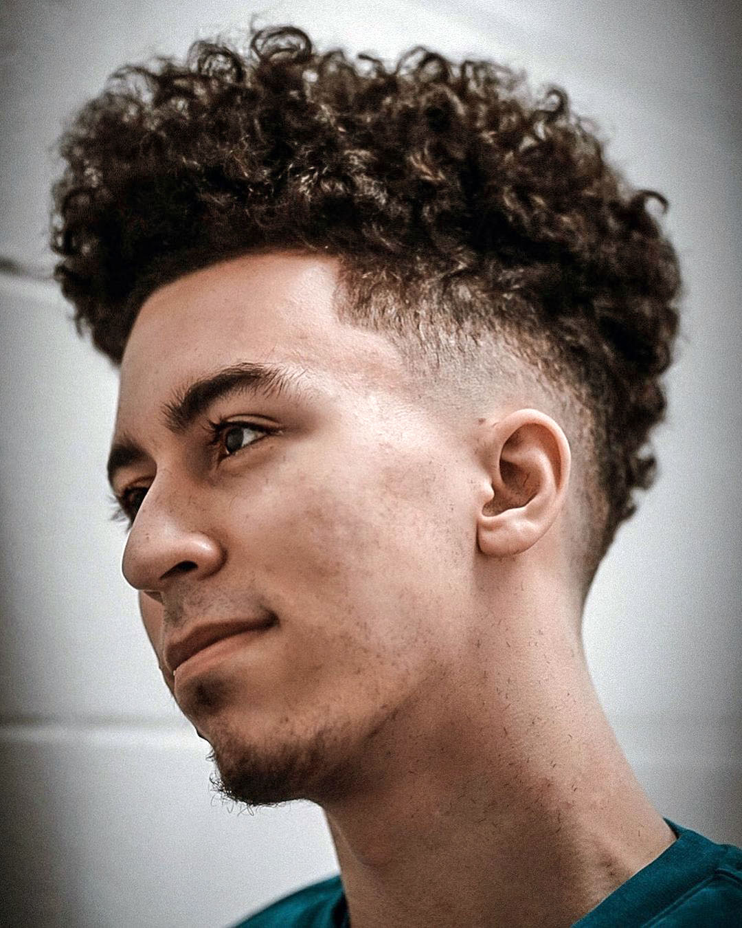 Skin Fade with Vertical Curly Style