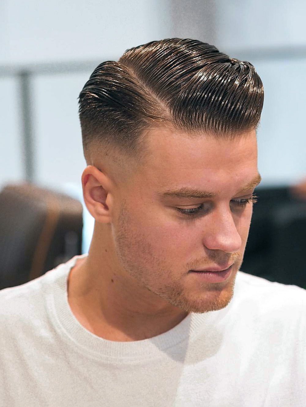 Tight Fade with Brushed Up Side Part