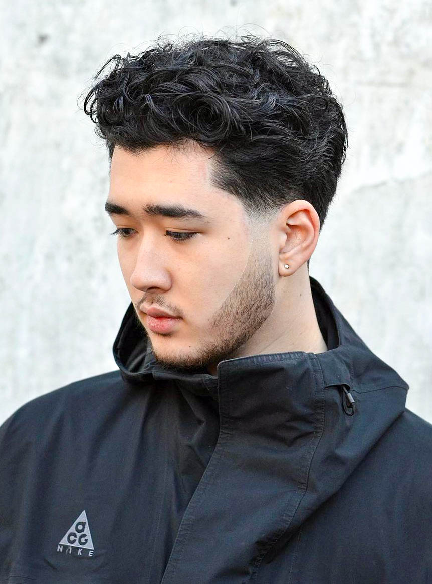 Curly Top with Low Fade and Discontinued Beard