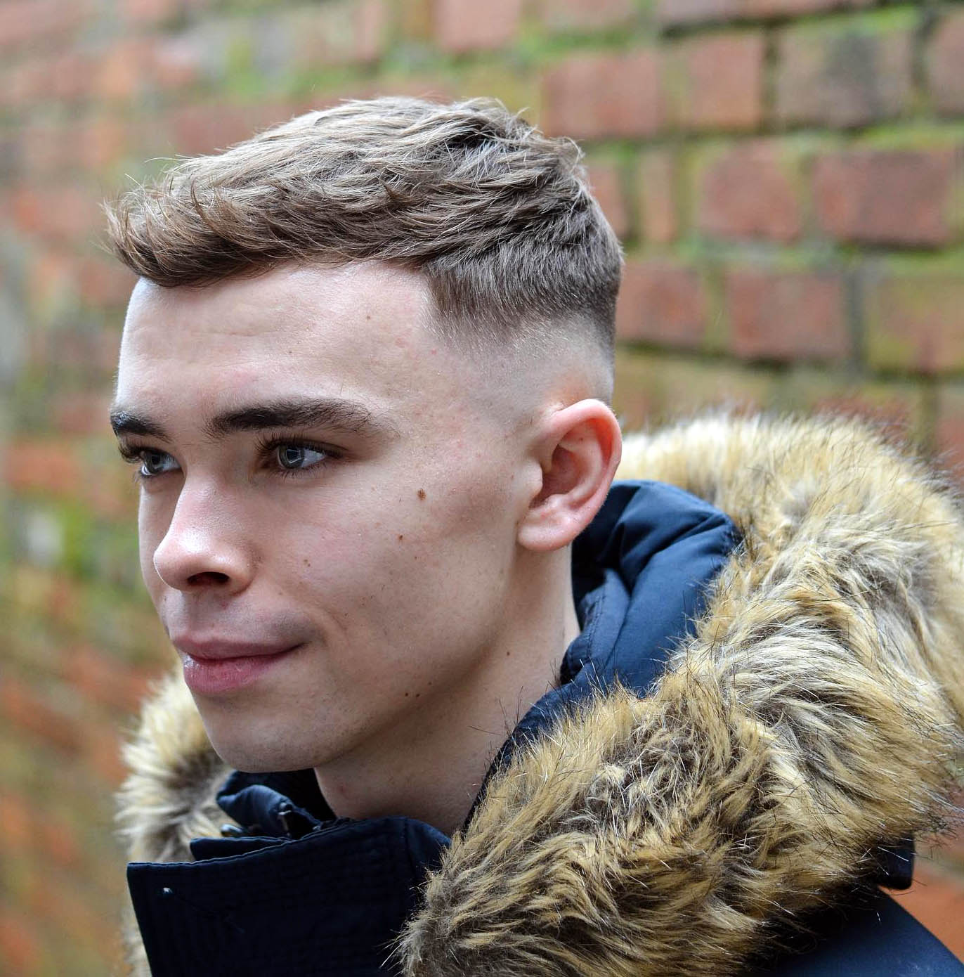 High Taper Fade with Short Spiked Up Fringe