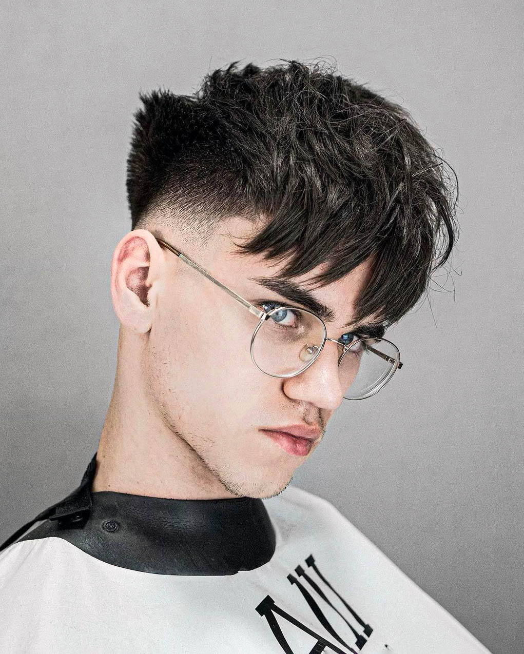 Low bald fade with bangs