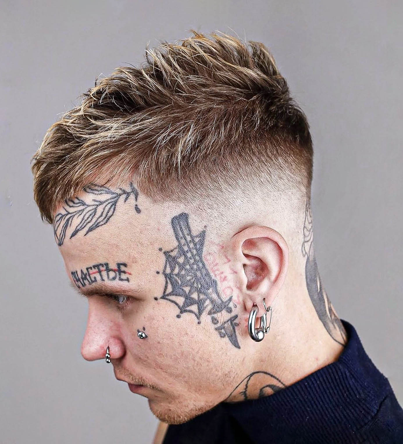 Highlighted Short Spiky Hair with Taper Fade 