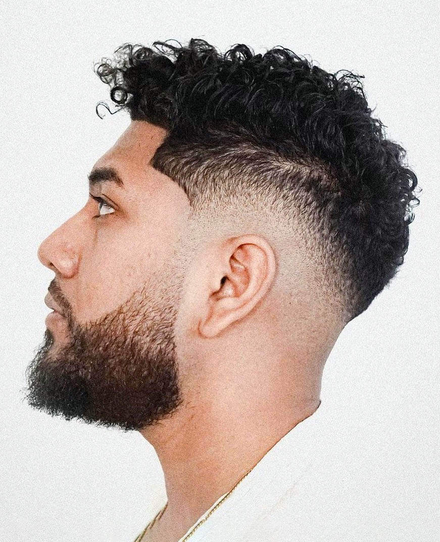 Neat Drop fade with Curly Top