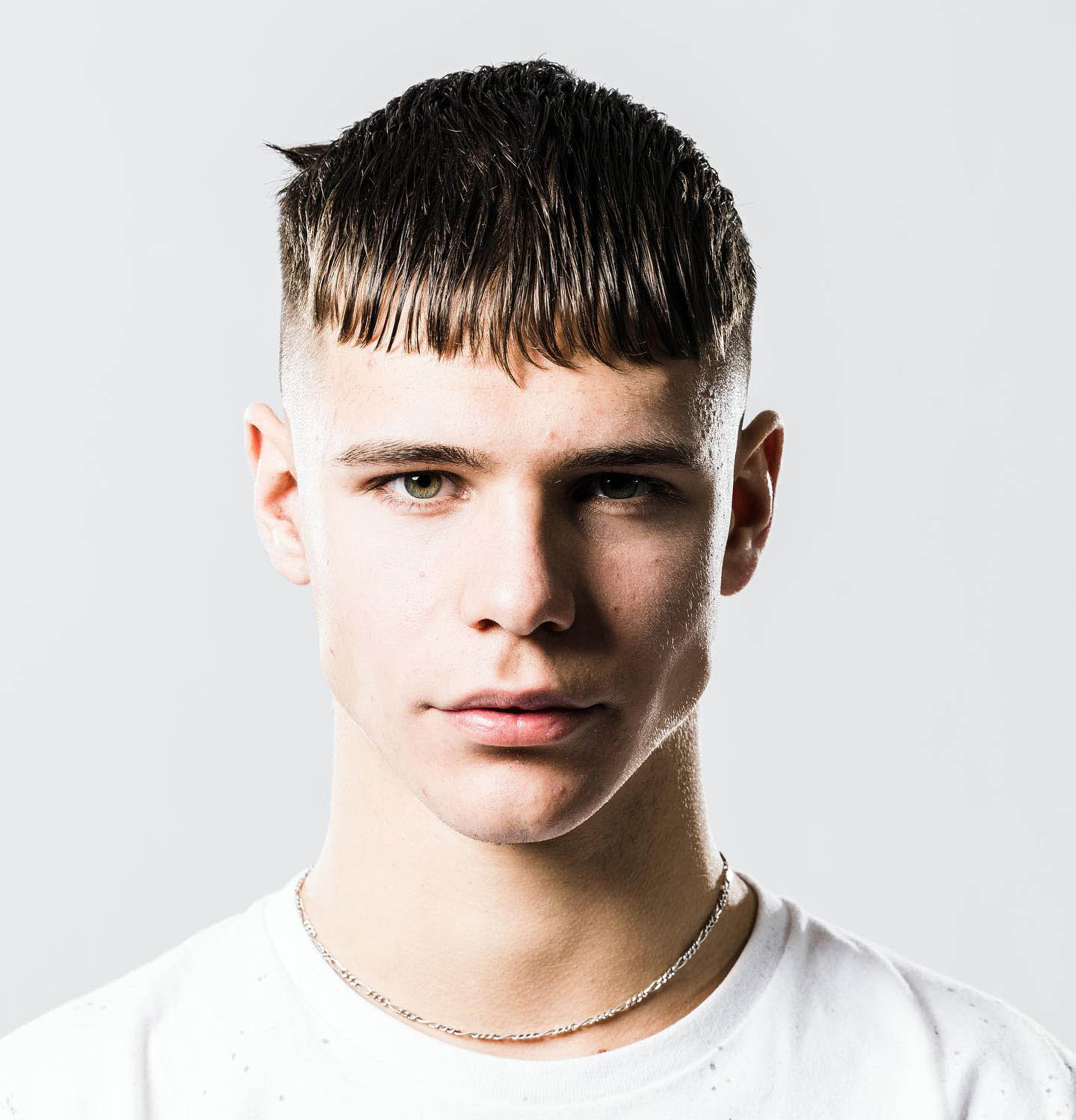 Xquizit Hair Design - French Crop Haircut The French crop haircut is a  short haircut for men characterized by a long top featuring a blunt fringe  with short backs and sides. The