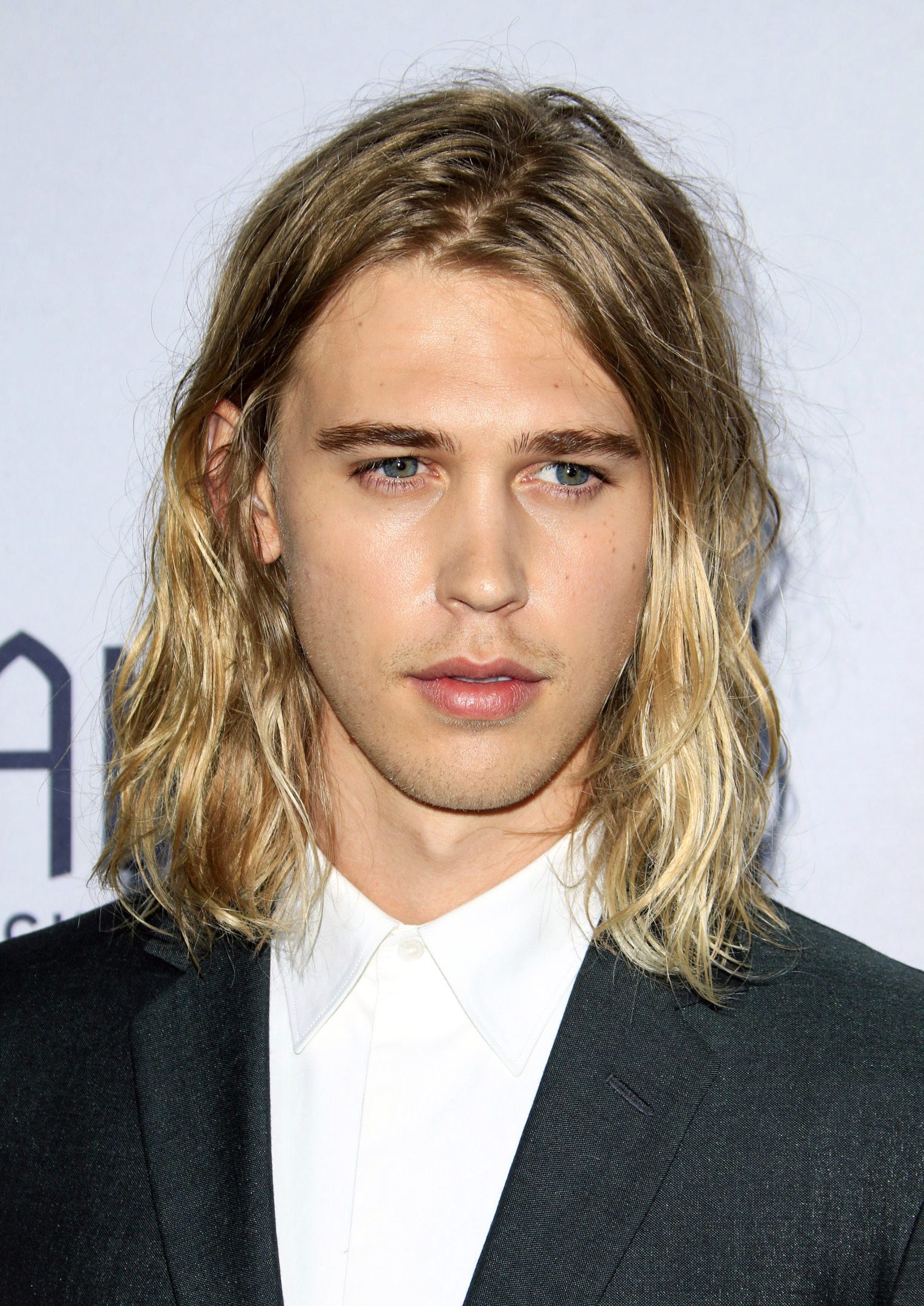 15 Best Hairstyles for Teenage Guys with Long Hair