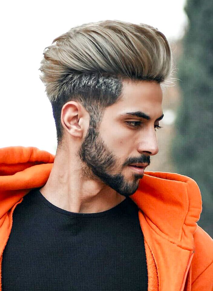 A young man with a Mohawk hairdo and a nose ring in Union Square Park, New  York City Stock Photo - Alamy