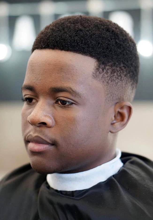 20 Eye Catching Haircuts For Black Boys For a fade to be a fade, the short back and sides taper in length from the longest length at the top here are some pictures about cool fade haircut for boys. 20 eye catching haircuts for black boys