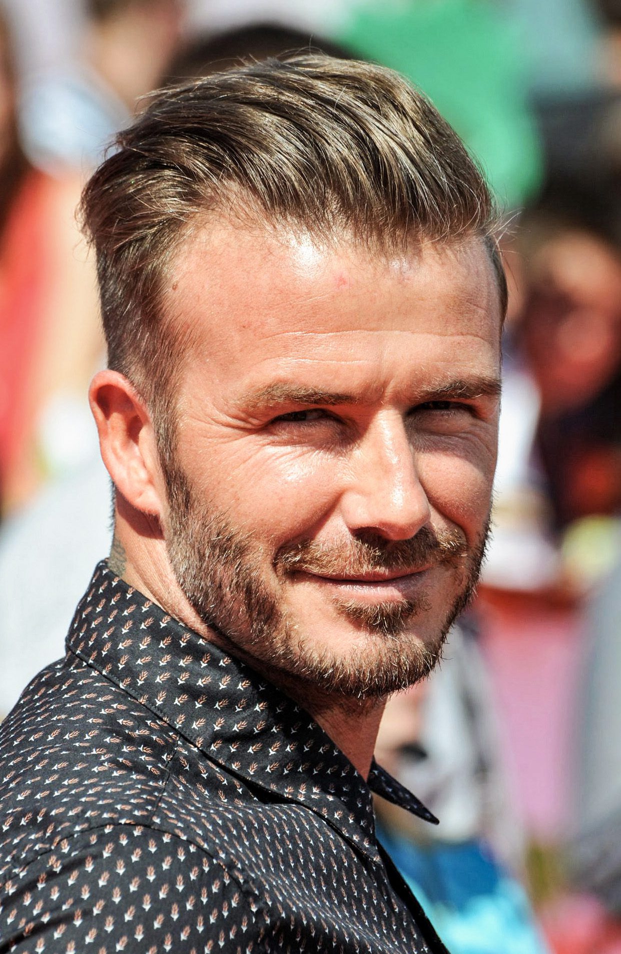 David Beckham’s slicked back undercut + facial hair combo