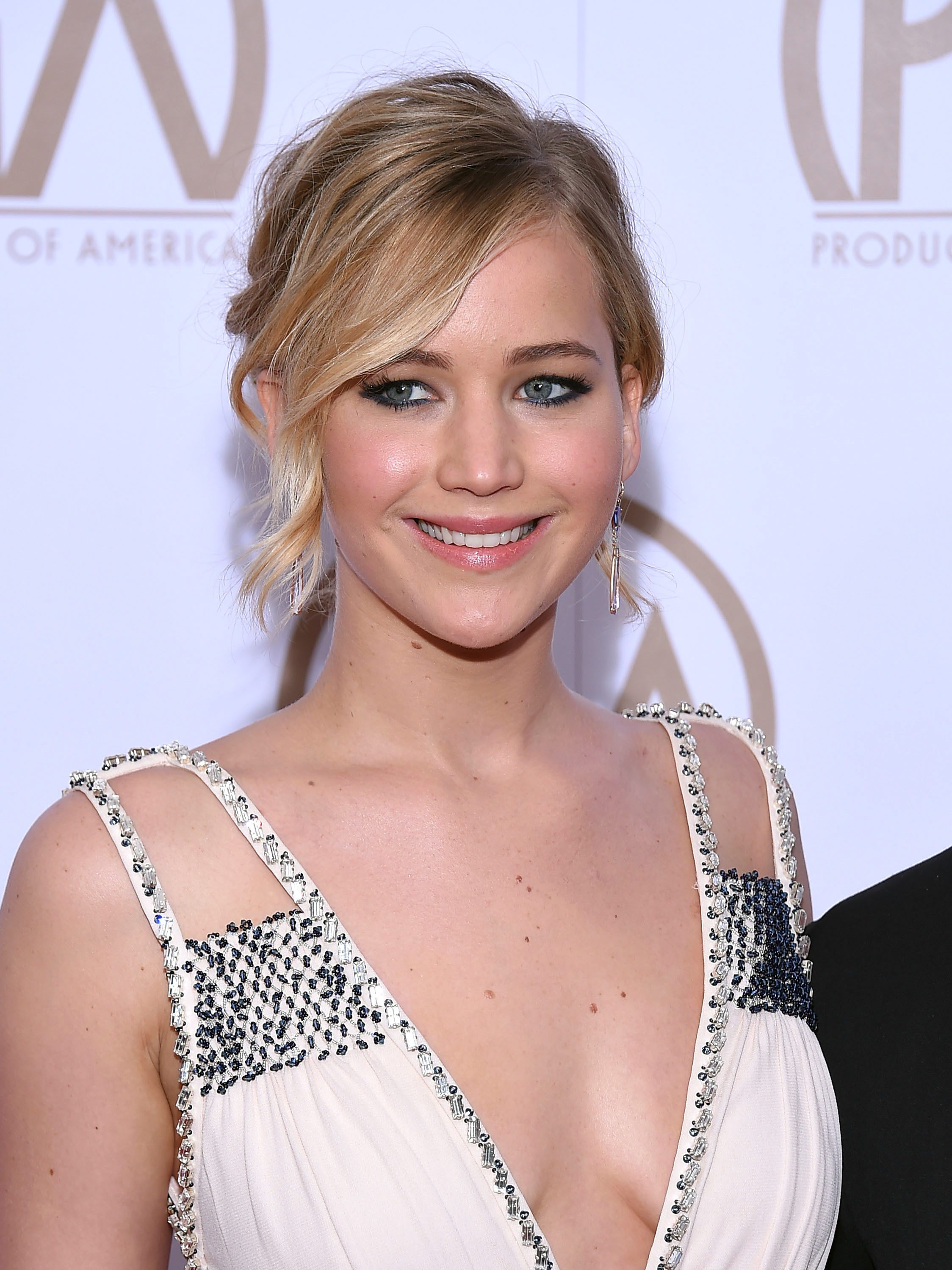 Jennifer Lawrence's Wavy Updo With Side Bangs