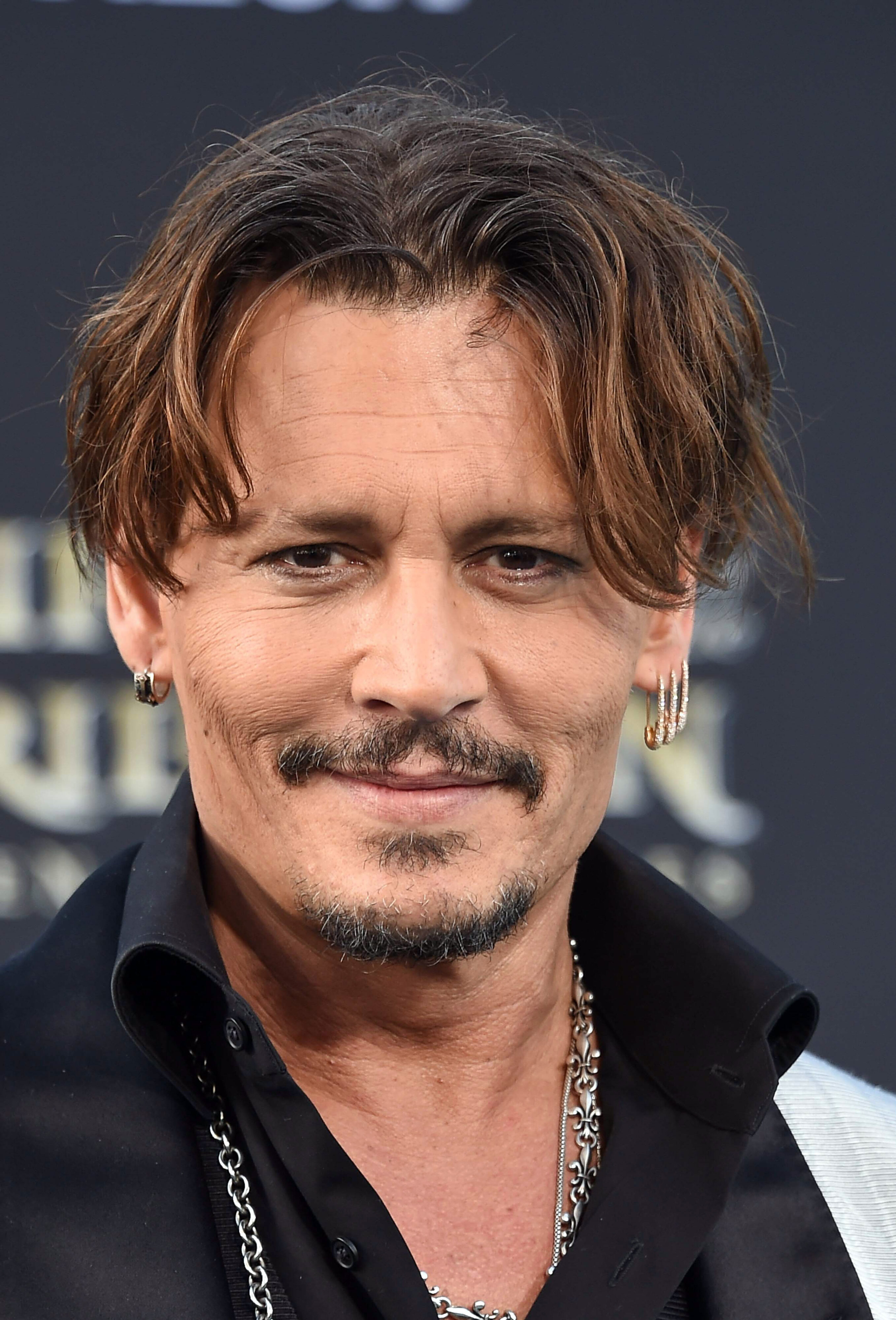 Johnny Depp's Messy Curtain Hair