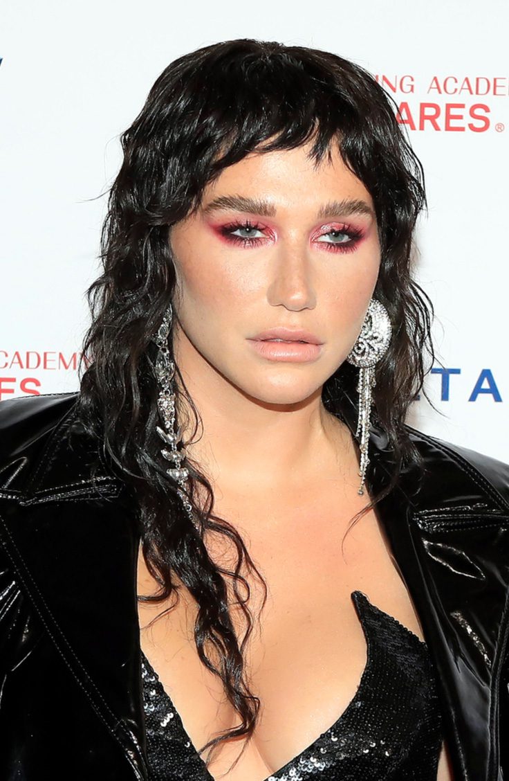 Kesha's Edgy Look with Curly Mullet