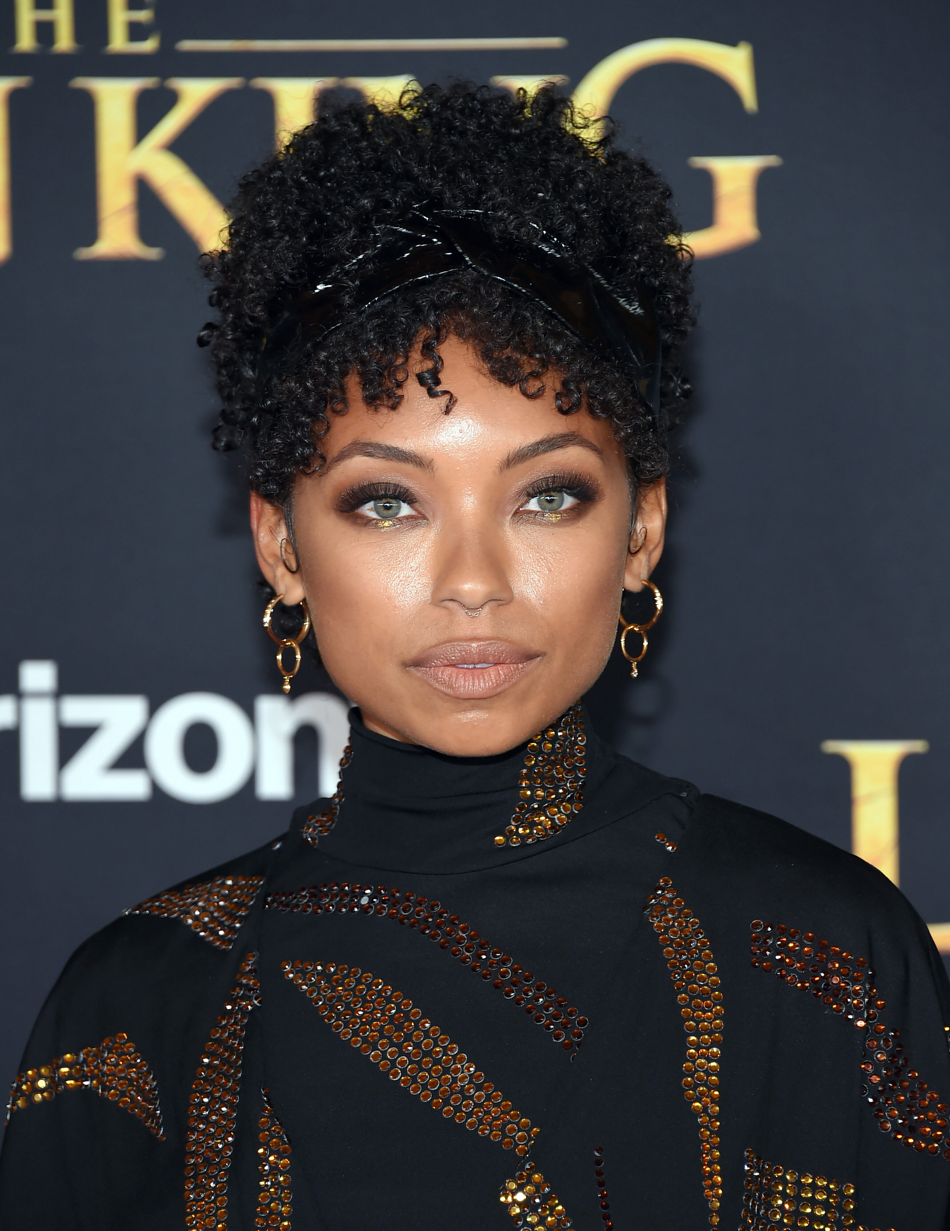 Logan Browning's Short Curls with Headband