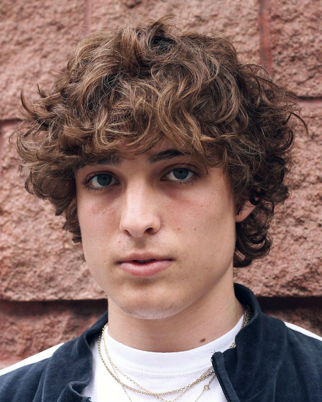 15 Best Hairstyles for Teenage Guys with Long Hair