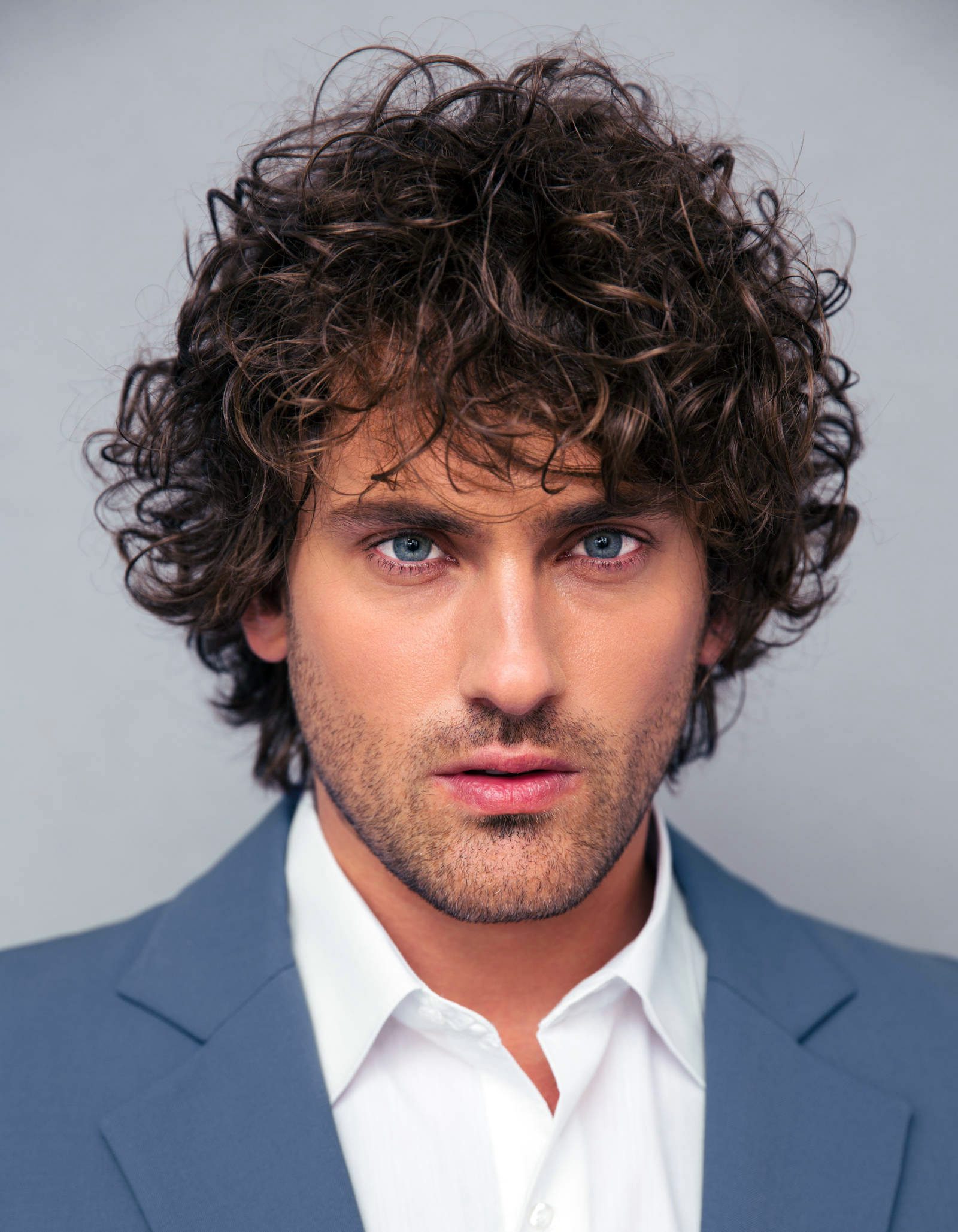 Summer Hairstyles for Men- Long Messy Curls