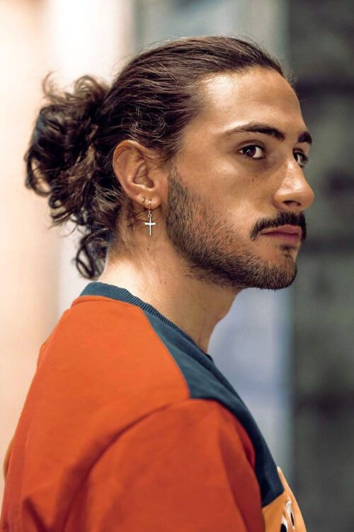 40 Types Of Man Bun Hairstyles Gallery How To Haircut Inspiration   Loose Open Ended Frizzly Man Bun 500x751 