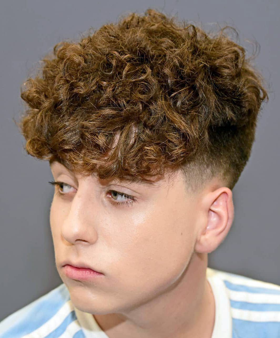 Messy Curly Fringes with Undercut Fade