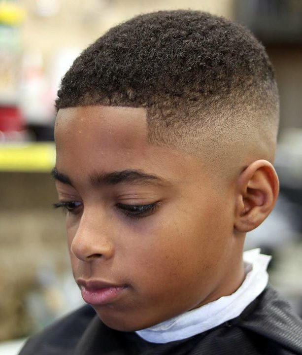 20 Eye Catching Haircuts For Black Boys Graduated, elevated hair with partitions, fades, afro, and long with edgy outlines are some of the cool black men haircuts and black boys haircuts for 2017. 20 eye catching haircuts for black boys