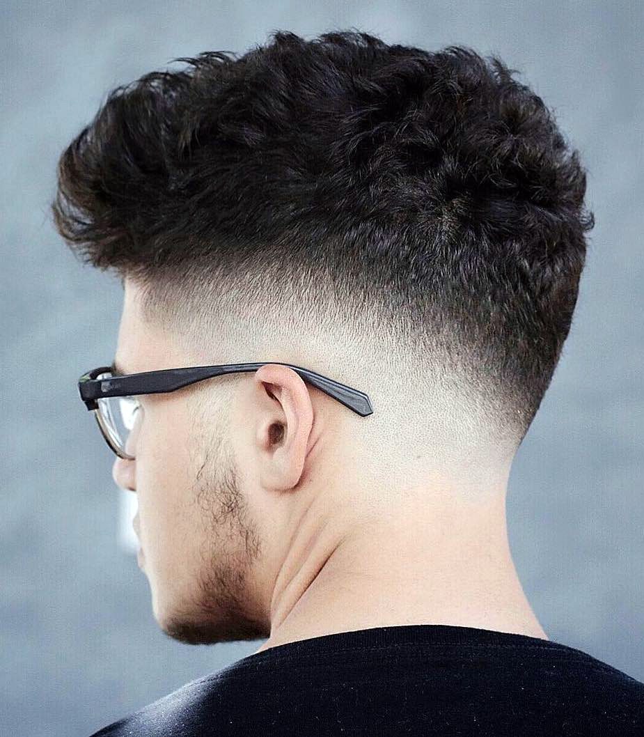 burst fade haircut with design