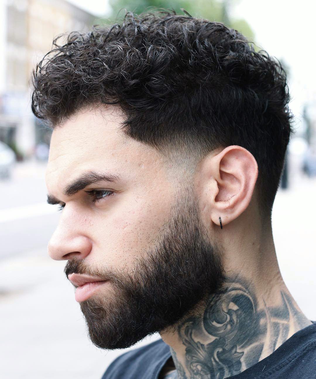 Sleek Temple Fade with Short Curls