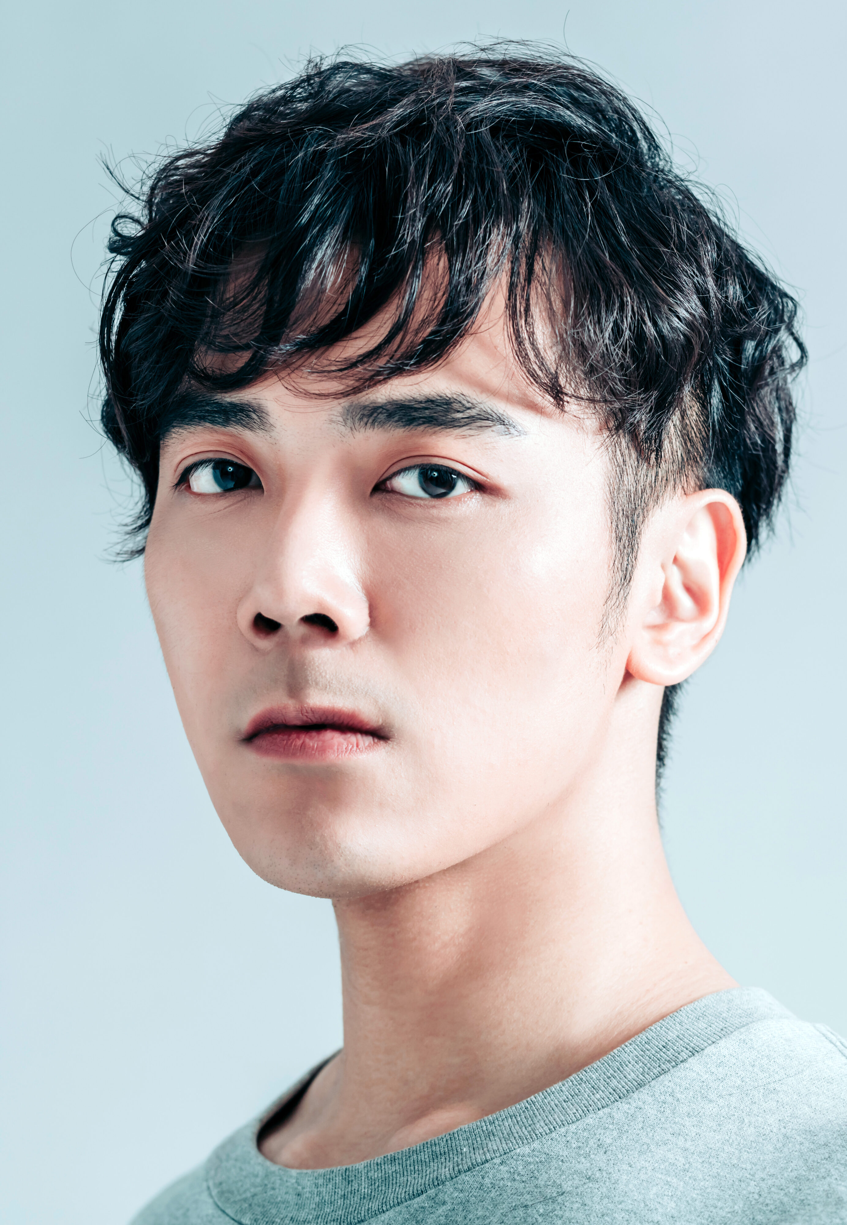 a man with undercut hairstyle with black hair color