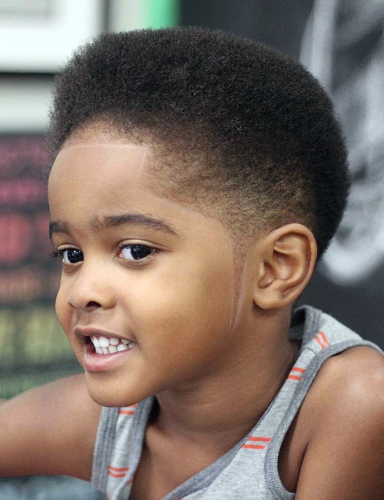 20 Eye Catching Haircuts For Black Boys The bald fades hairstyle for dark men can make cut sides significantly shorter. 20 eye catching haircuts for black boys