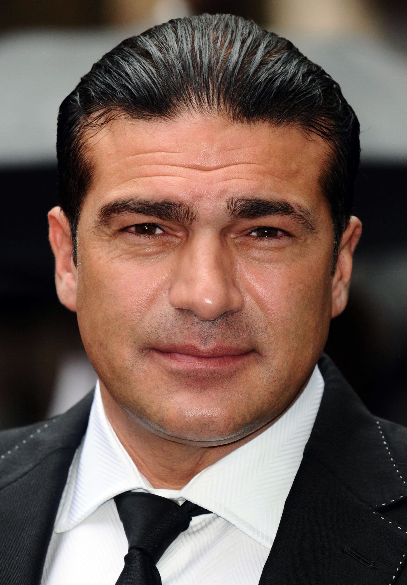 Tammer Hassan slicked back