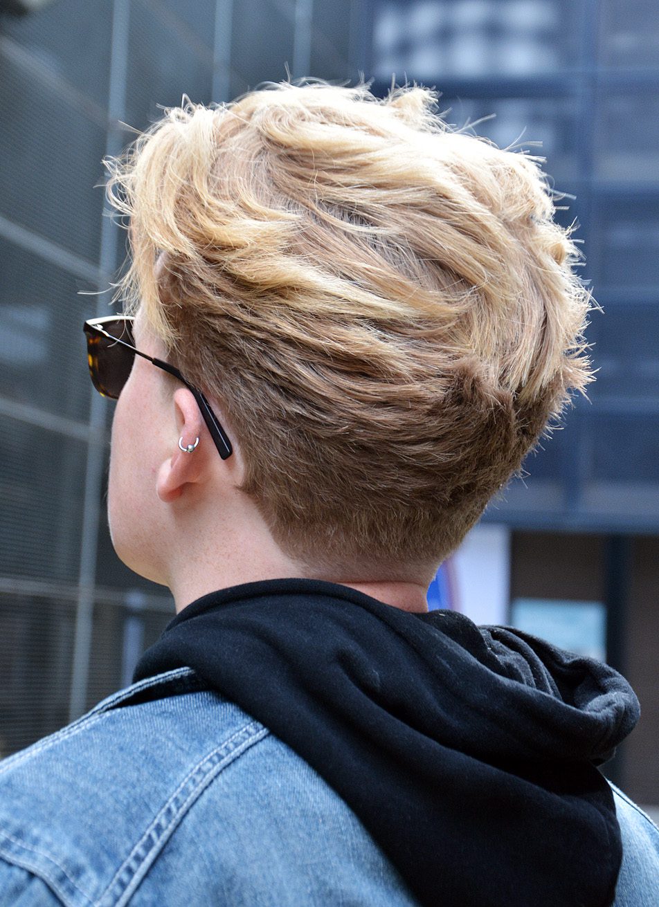 Teenage Boy Blonde Layered Hairstyle with Tapered Neckline