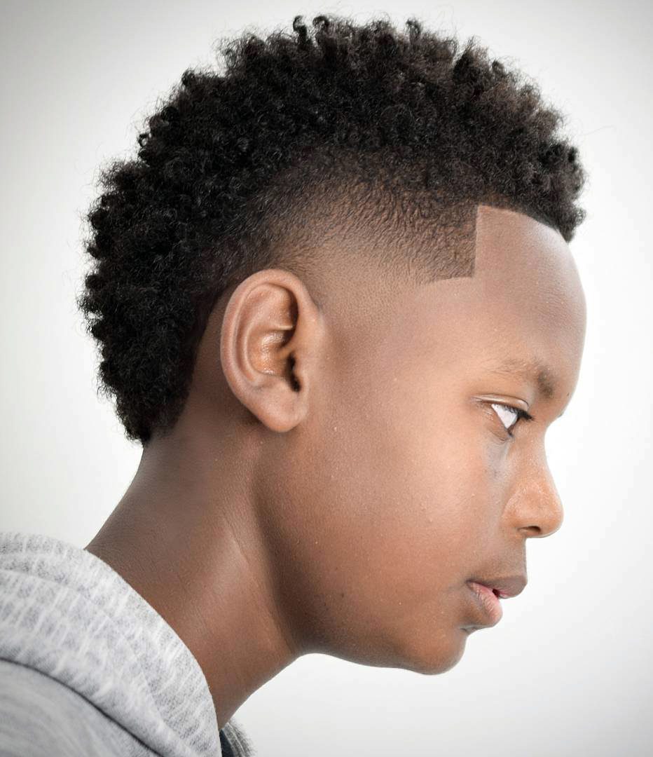 20 Eye Catching Haircuts For Black Boys 1.12 trending high fade haircut with beard style. 20 eye catching haircuts for black boys