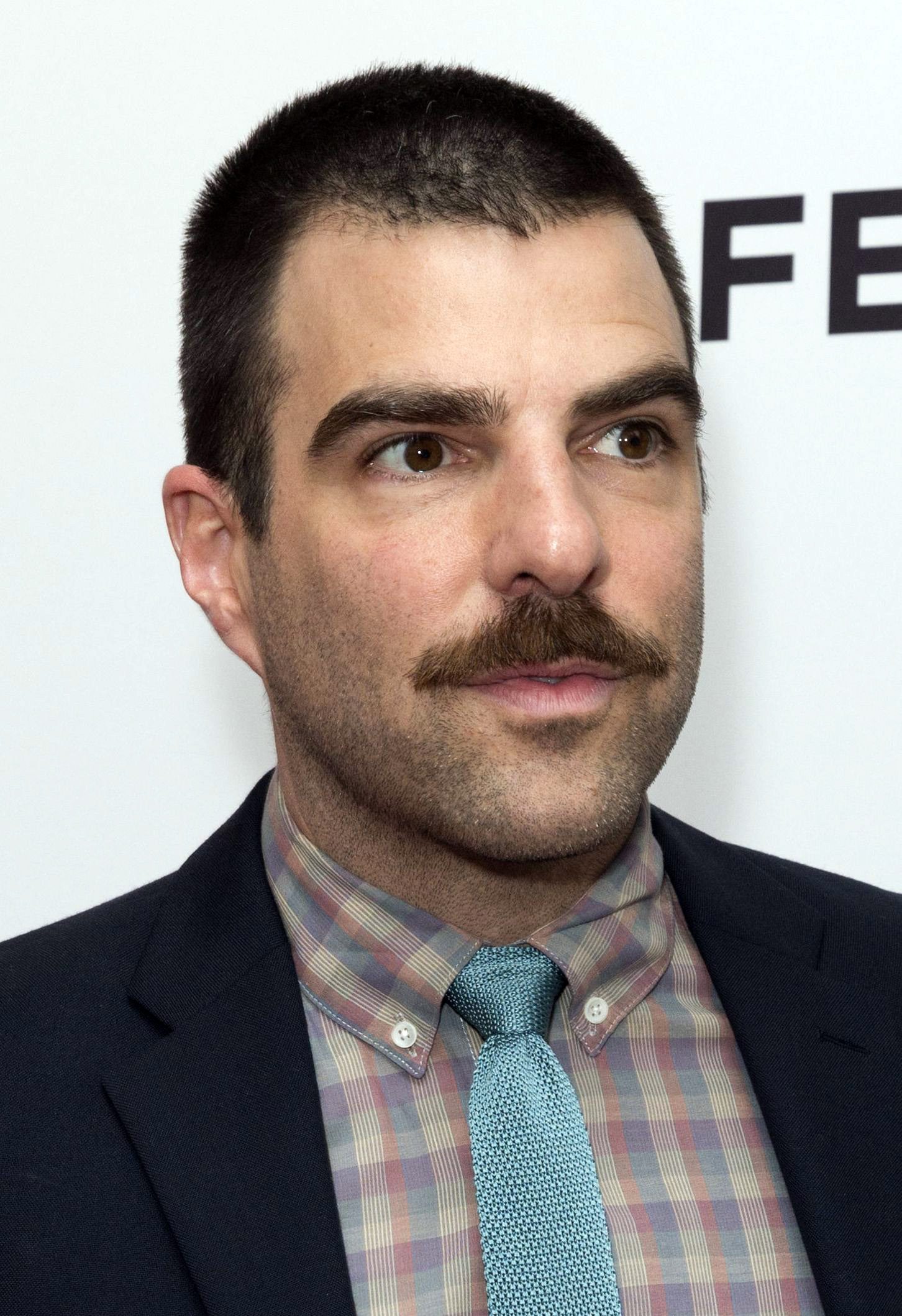 Zachary Quinto short buzz cut with mustache